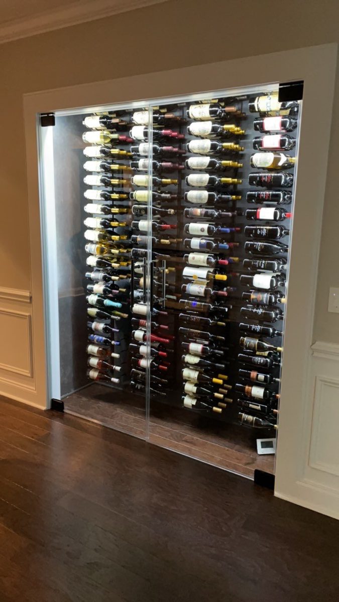 Custom Glass Wine Enclosure with Wine Bottle Display in Charlotte